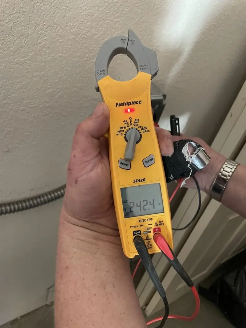 Voltage testing with clamp meter during Aluminum Wiring Replacement in Dickinson